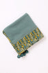 Shawl in plain cotton blend jacquard with pom poms